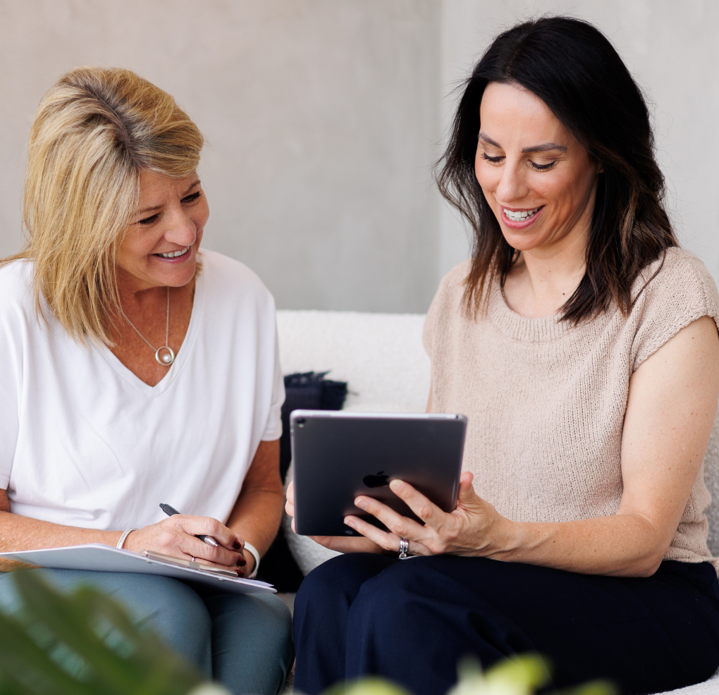 Skin therapist consulting with a client at Instincts Skin Clinic Bella Vista